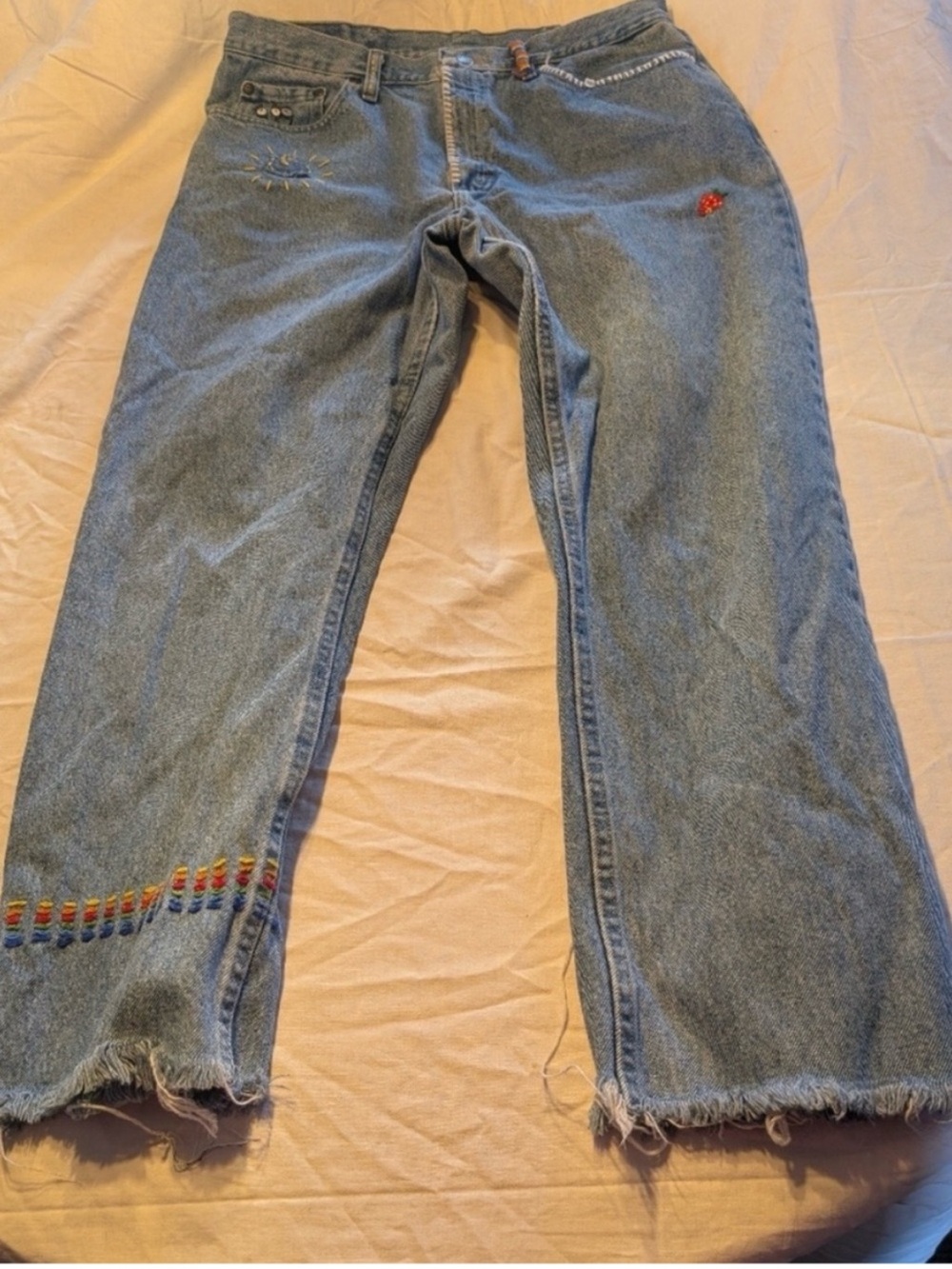 Wrangler light blue denim jeans with pink patch